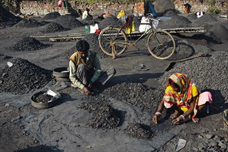 Workers are sorting out coal in a small coal company, Jharkhand, India, Asia