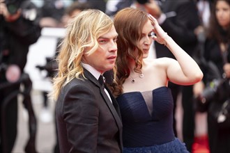 Cannes, France, 14 May 2024: Christophe Guillarme and Agatha Maksimova during the opening of the
