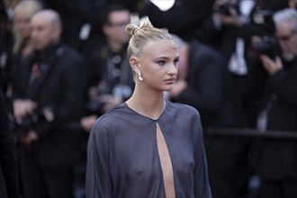 Cannes, France, 17.5.2024: Mia Regan at the premiere of Kinds of Kindness on the red carpet of the
