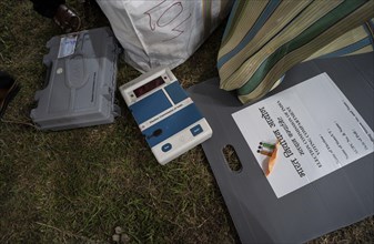 Barpeta, India. 6 May 2024. Polling officials collects Electronic Voting Machines (EVMs) and Voter