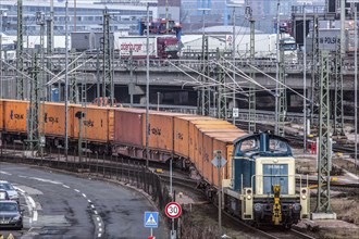 A locomotive pushes wagons with containers to Burchardkai in the Port of Hamburg, Hamburg,