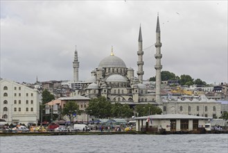 A mosque with two minarets on the coast of Istanbul, grey sky in the background, Istanbul, Istanbul