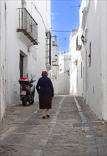 Senior citizens in the narrow streets of Vejer, Andalusia, Spain, Europe