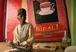 Merchant in his tea shop, advertisement for a tea brand, Udaipur, India, Asia