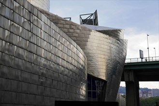 Guggenheim Museum Bilbao, Spain, Europe, Exterior view of a modern brushed steel building in an