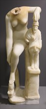 Small Aphrodite StatueAncient ivory statue of a female figure with abstraction, interior, Grand