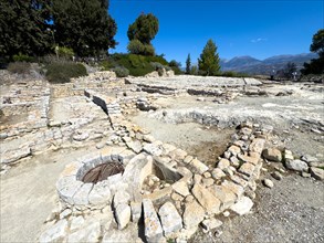 View of upper part of settlement of Phaistos with ancient foundation walls, ground find of ancient