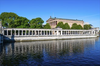 Old National Gallery and colonnades reflected in the Spree, Museum Island, Berlin-Mitte, Berlin,