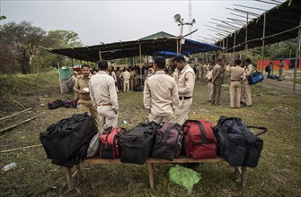 Barpeta, India. 6 May 2024. Police personnels arrives with luggage to leave for allocated polling