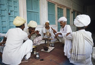 Collective opium consumption by hindu men, hindu local ritual, rajasthan, India, Asia
