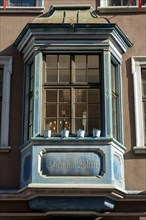 Historic house facade and decorated bay window in the old town of Schaffhausen, Canton of