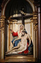 Iglesia San Nicolas de Bari, A baroque Pieta sculpture shows the mourning Mary holding the dead