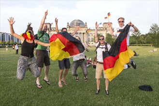 Football fans celebrate the German national football team's entry into the semi-finals at the