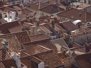 Close-up of tiled roofs in a historic european city with narrow streets, the old town of Dubrovnik
