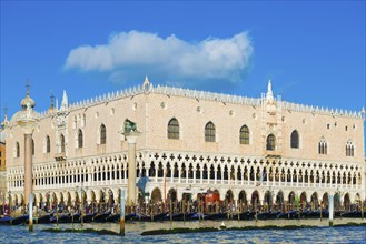 Ducal Palace on Saint Mark Square and Grand Canal with Many Gondola in a Sunny Day in Venice,