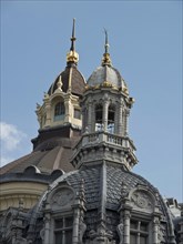 Close-up of a historic bell tower with decorated roof and towers, Historic buildings on the market