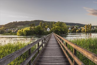 Wooden bridge over the Rhine to the Werd monastery island near Stein am Rhein, Eschenz, Canton