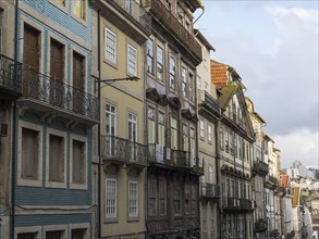 Historic buildings with ornate facades and balconies in an old town, historic buildings and