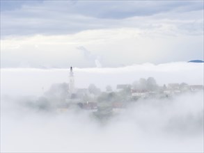 Church rises out of the morning mist, Frauenberg pilgrimage church, near Leibnitz, Styria, Austria,