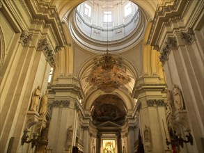 Magnificent nave with decorated dome and ornate columns, palermo in sicily with an impressive