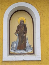 Image of a figure of a saint, fresco on a wayside cross, near St.Andrae-Hoech, Sausaler Weinland,