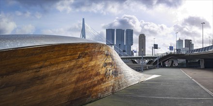 Artwork Twist & Shout by Martand Khosla, behind it the Erasmus Bridge and skyscrapers, Rotterdam,