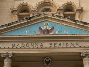 Church facade with a Madonna decoration and inscriptions from 1921 and 1971, Valetta, Malta, Europe