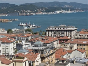 City view with red roofs, harbour, sea and surrounding hills on a clear day, Bari, Italy, Europe