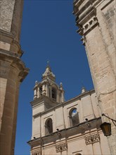 Close-up of bell towers of a baroque building under a clear sky, Historic buildings with beautiful