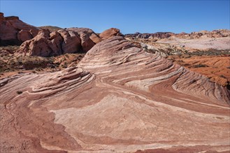 Layered rock formations along the Fire Wave Trail at Valley of Fire State Park near Overton,