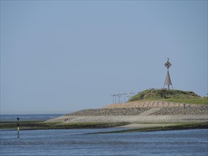 Dune landscape with metal structure and sea in the background, Baltrum Germany