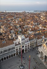 St Mark's clock tower on St Mark's Square, view from the Campanile di San Marco bell tower, city