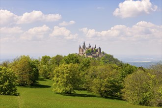 Hohenzollern Castle near Hechingen, cloudy sky, Zollernalbkreis, Swabian Alb, Baden-Wuerttemberg,