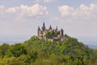 Hohenzollern Castle near Hechingen, cloudy sky, Zollernalbkreis, Swabian Alb, Baden-Wuerttemberg,