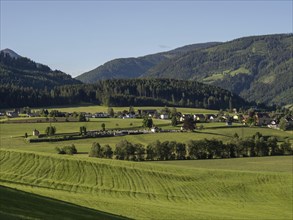 Meadows and fields at the edge of the forest, Irdning cemetery, Irdning, Styria, Austria, Europe