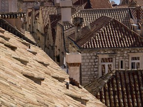 View of the closely spaced terracotta roofs of the historic city, the old town of Dubrovnik with