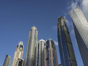Skyscrapers of various sizes in front of a clear blue sky, Abu Dhabi, United Arab Emirates, Asia