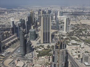 Aerial view of a modern city with numerous skyscrapers and a wide skyline, Dubai, Arab Emirates