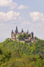 Hohenzollern Castle near Hechingen, cloudy sky, Zollernalbkreis, Swabian Alb, Baden-Wuerttemberg,