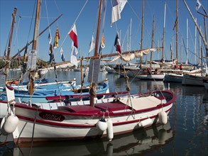 Close-up of sailing boats in the harbour against a blue sky, la seyne sur mer on the mediterranean
