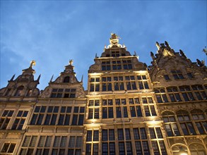 Several illuminated historical buildings at night under a blue sky, Historical buildings on the