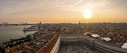Panorama, St Mark's Square and Basilica di Santa Maria della Salute on the Grand Canal at sunset,