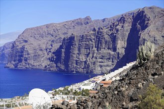 Los Gigantes cliffs, Canary Islands, Spain, Europe, Steep cliffs towering over the blue sea, with
