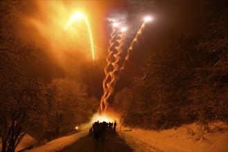 People celebrating New Year's Eve in a little village, Bavaria, Germany, Europe