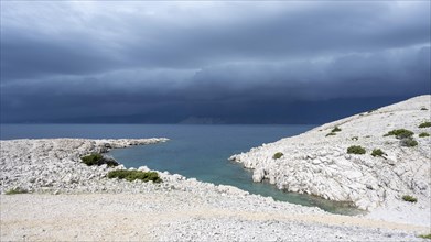 Stormy atmosphere and dark clouds on the coast, island of Pag, Zadar, Dalmatia, Croatia, Europe