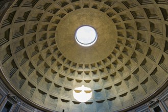 Old Beautiful Ceiling with the Hole and Sunlight on the Ancient Building Pantheon in Rome, Lazio,