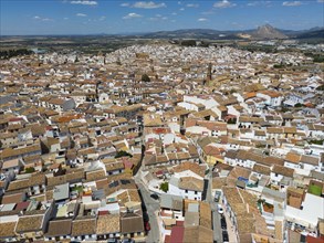 Aerial view of a picturesque spanish town with tightly packed rooftops and narrow streets