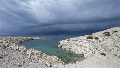 Stormy atmosphere and dark clouds on the coast, island of Pag, Zadar, Dalmatia, Croatia, Europe