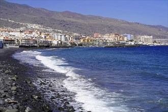Black volcanic beach in Candelaria, Tenerife, Canary Islands, Spain, Europe, coastal town on a
