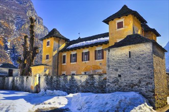 Beautiful Rustic Castle in a Sunny Winter Day with Clear Sky in Brione, Ticino, Switzerland, Europe